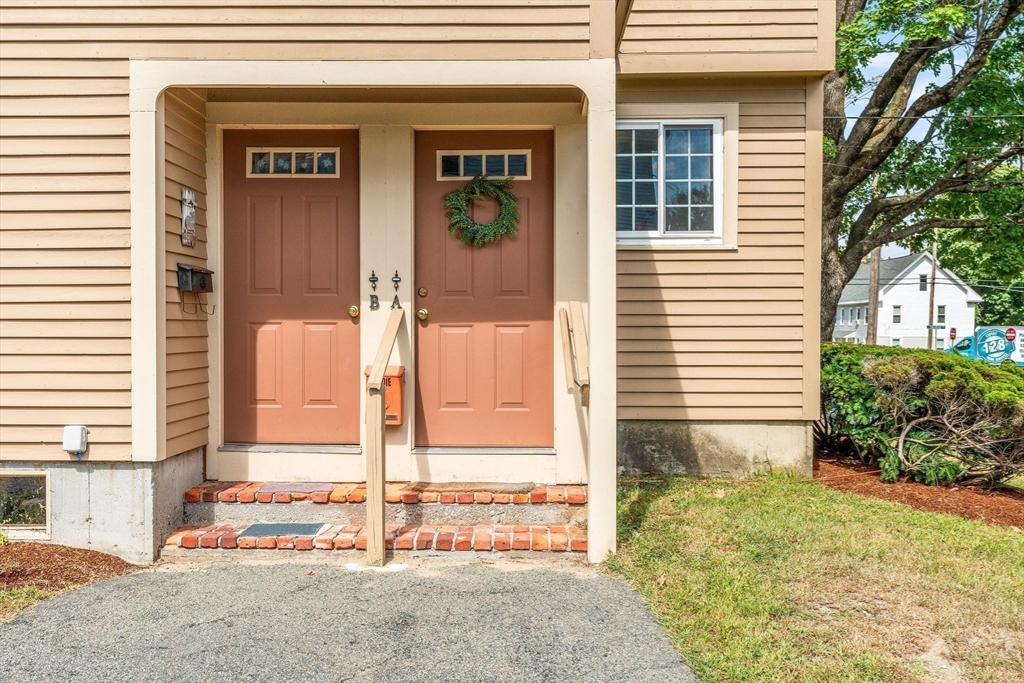 30 Pope Street, Unit A Hudson, MA 01749 - Photo 2 of 9 a view of house with outdoor space