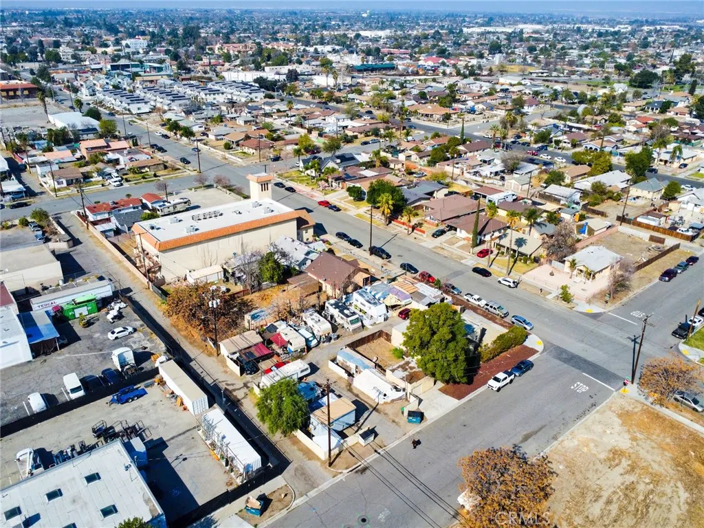 584 East H Street Colton, CA 92324 - Photo 6 of 18 an aerial view of residential houses with outdoor space