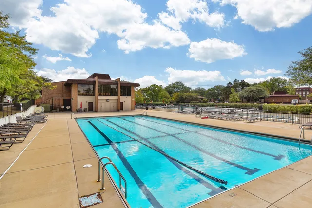 a view of a lake with a building in the background
