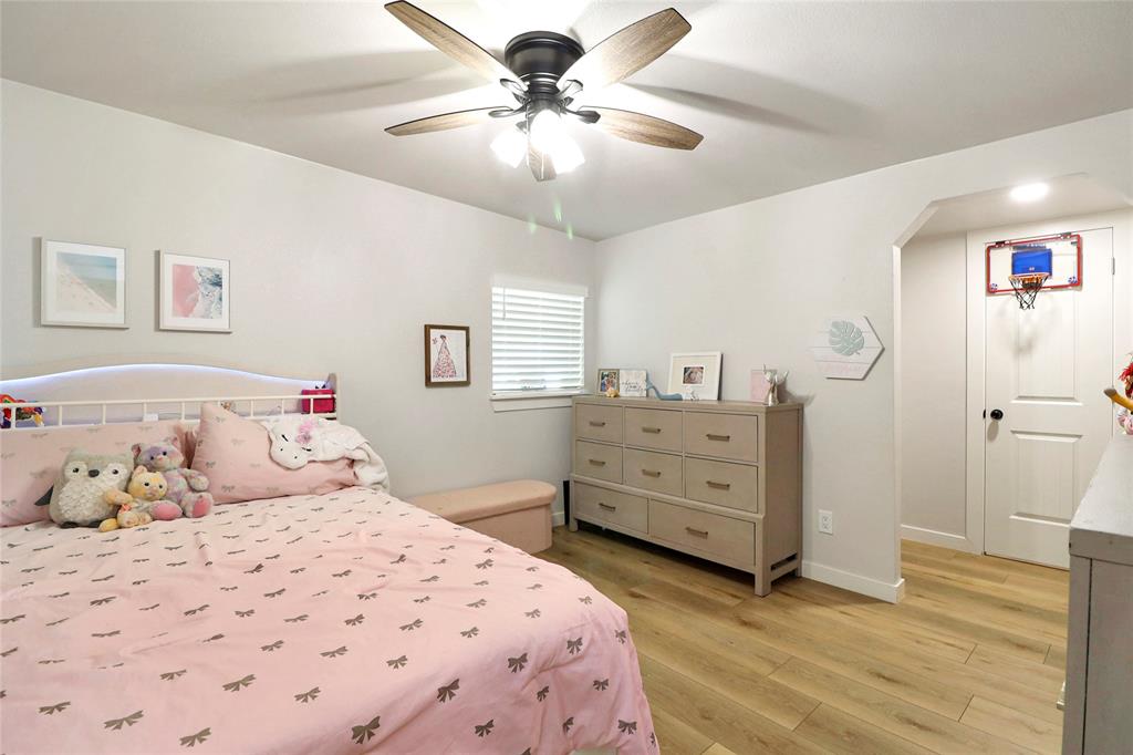 2408 Strader Road DISH, TX 76247 - Photo 22 of 40 a bedroom with a bed and a dresser