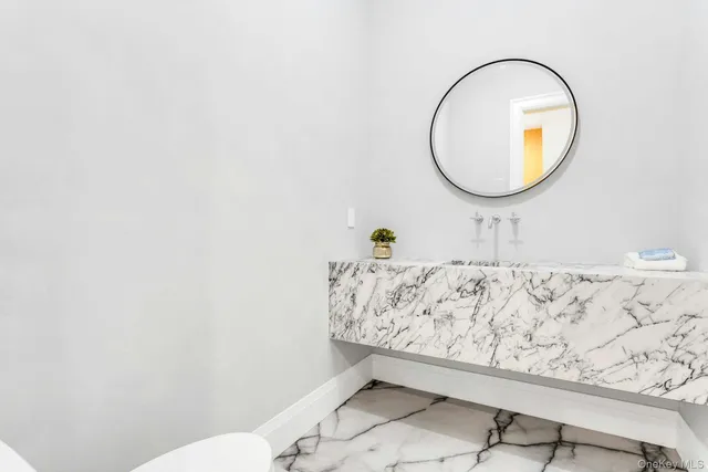 a view of a hallway with windows