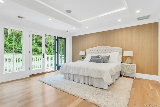 a bedroom with a bed and a fireplace