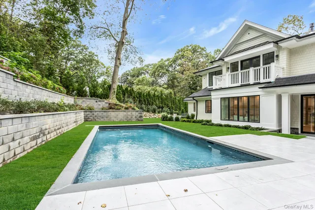 a view of a yard with an outdoor seating