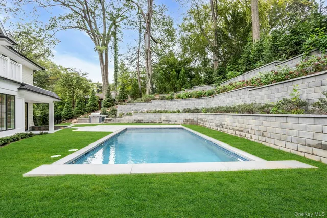 a view of a house with a swimming pool