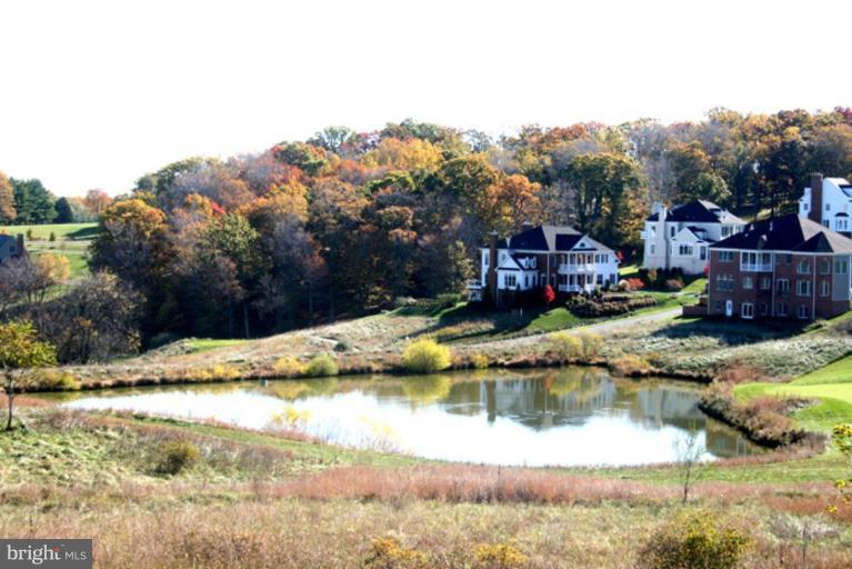 40694 Farm Market Road Leesburg, VA 20176 - Photo 17 of 30 a view of houses with water fall