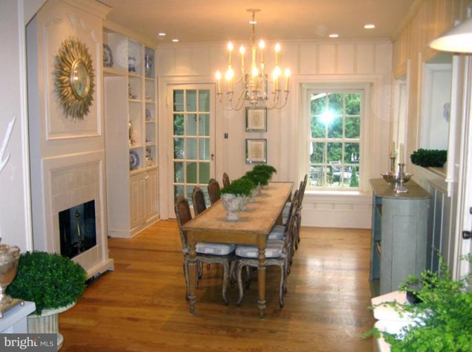 40694 Farm Market Road Leesburg, VA 20176 - Photo 2 of 30 a view of a dining room with furniture window and wooden floor