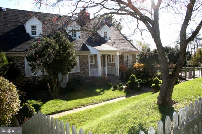 40694 Farm Market Road Leesburg, VA 20176 - Photo 21 of 30 a view of a house with a yard