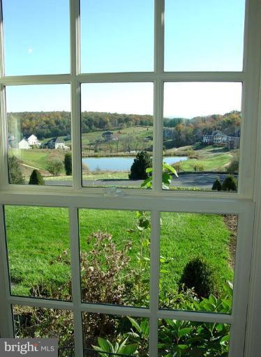 40694 Farm Market Road Leesburg, VA 20176 - Photo 26 of 30 a view of a garden from a window