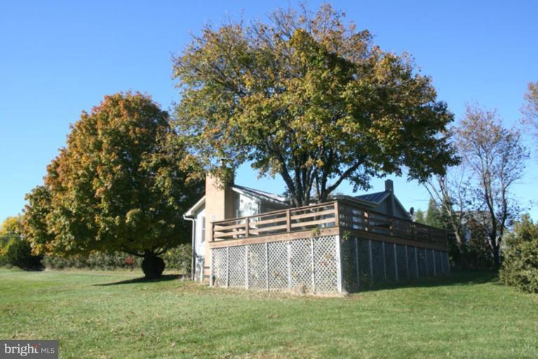 40694 Farm Market Road Leesburg, VA 20176 - Photo 5 of 30 a view of a house with a yard