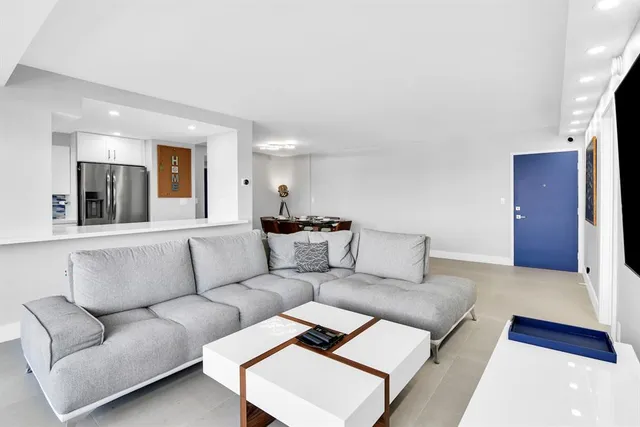 a living room with furniture and a couch