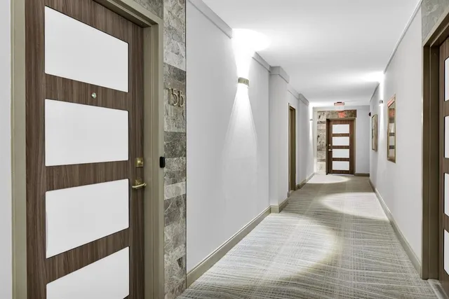 a kitchen with a stove and a shower