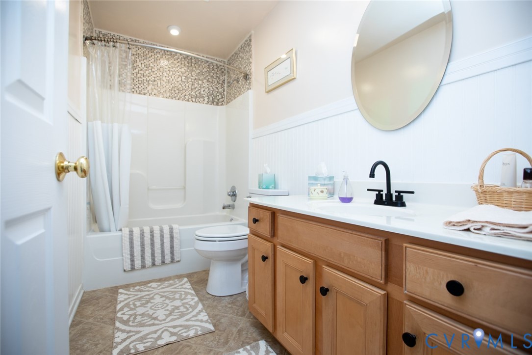 110 Jesse's Way Farmville, VA 23901 - Photo 36 of 56 a bathroom with a sink a toilet and a mirror