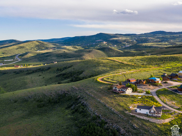 588 Raspberry Patch Road Garden City, UT 84028 - Photo 10 of 74 Aerial view of a mountain backdrop
