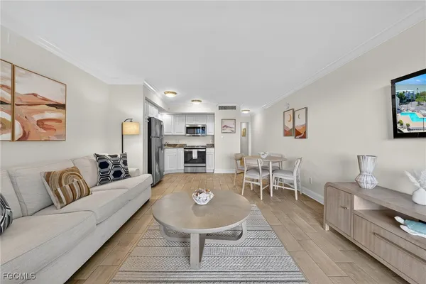 a living room with furniture and a table