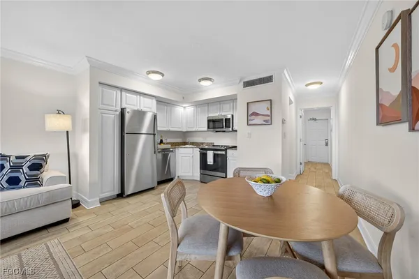 a view of a dining room with furniture