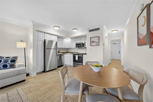 a view of a dining room with furniture