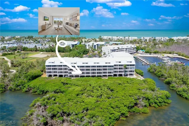 a view of a lake with a building in the background