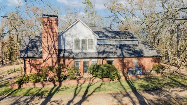 a view of house with outdoor space