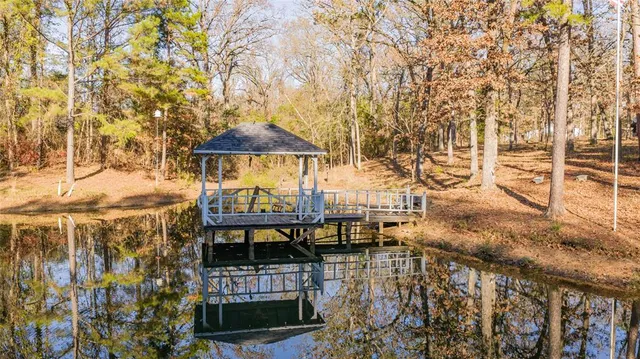 a view of a lake with sitting area