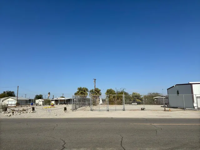 a view of a parking area and a city view