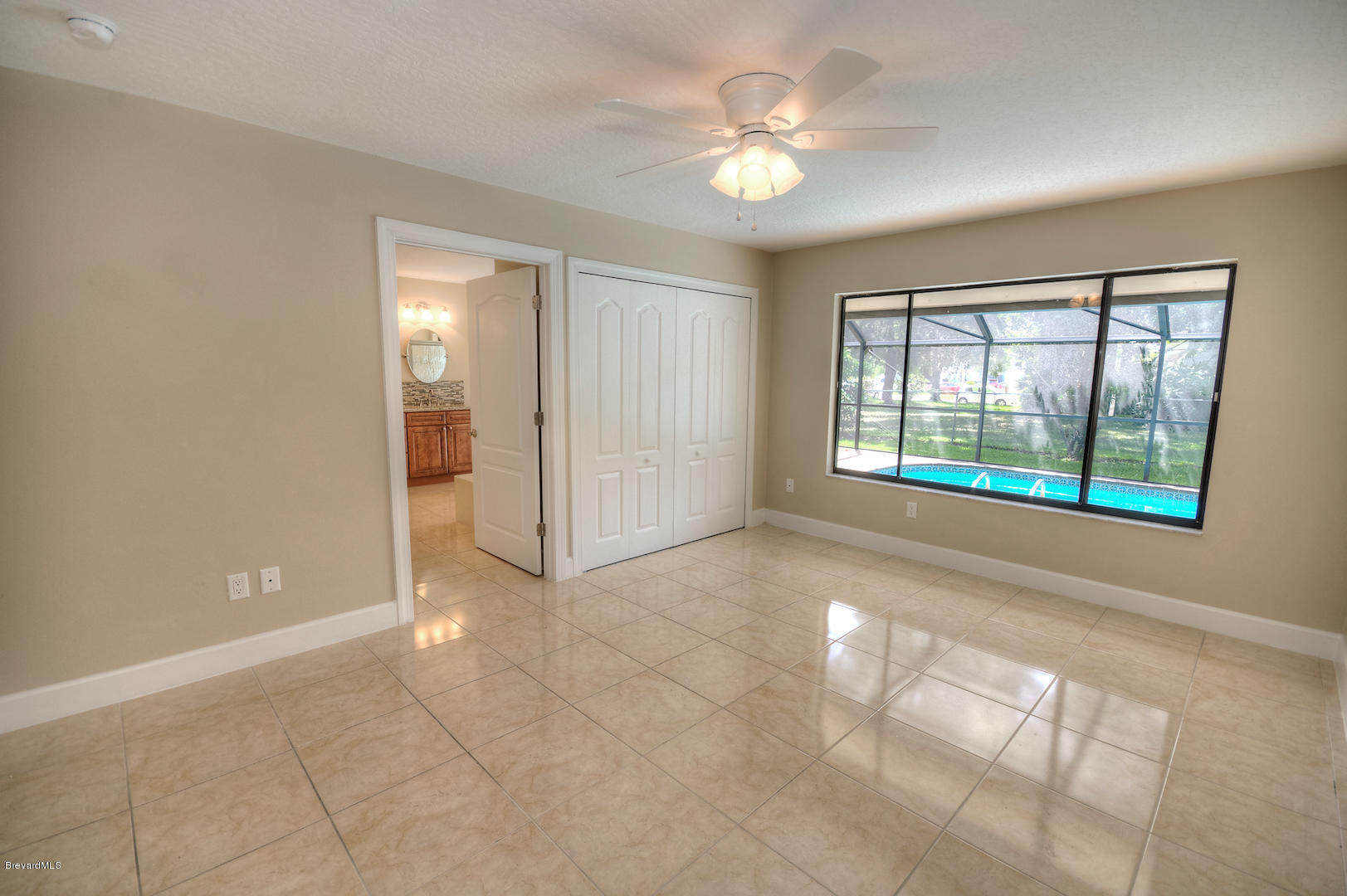 1358 Cherry Hills Road Northeast Palm Bay, FL 32905 - Photo 17 of 25 masterbedroom