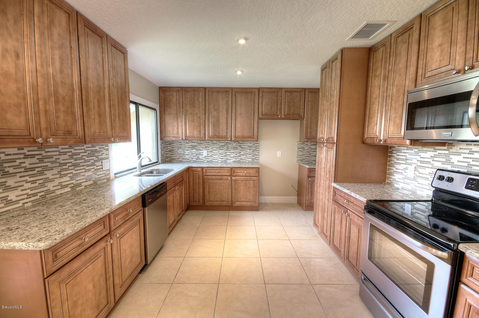1358 Cherry Hills Road Northeast Palm Bay, FL 32905 - Photo 5 of 25 kitchen