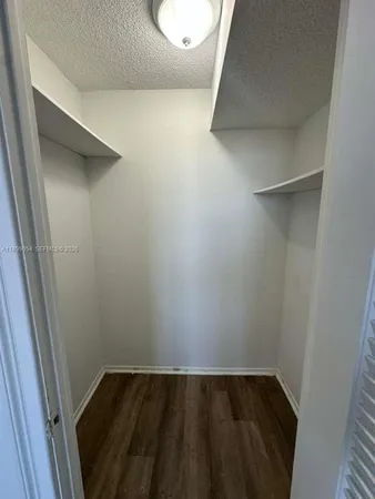 a bathroom with a toilet a sink and bathtub