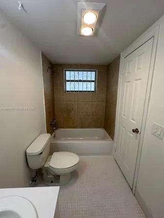 a view of swimming pool from a balcony