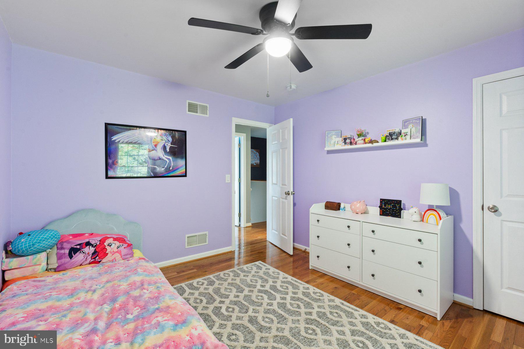 1903 Hain Road New Freedom, PA 17349 - Photo 24 of 40 a bedroom with a bed and chandelier