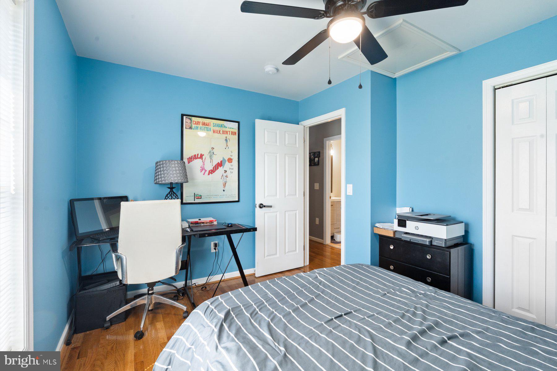 1903 Hain Road New Freedom, PA 17349 - Photo 26 of 40 a bedroom with a bed and a chandelier