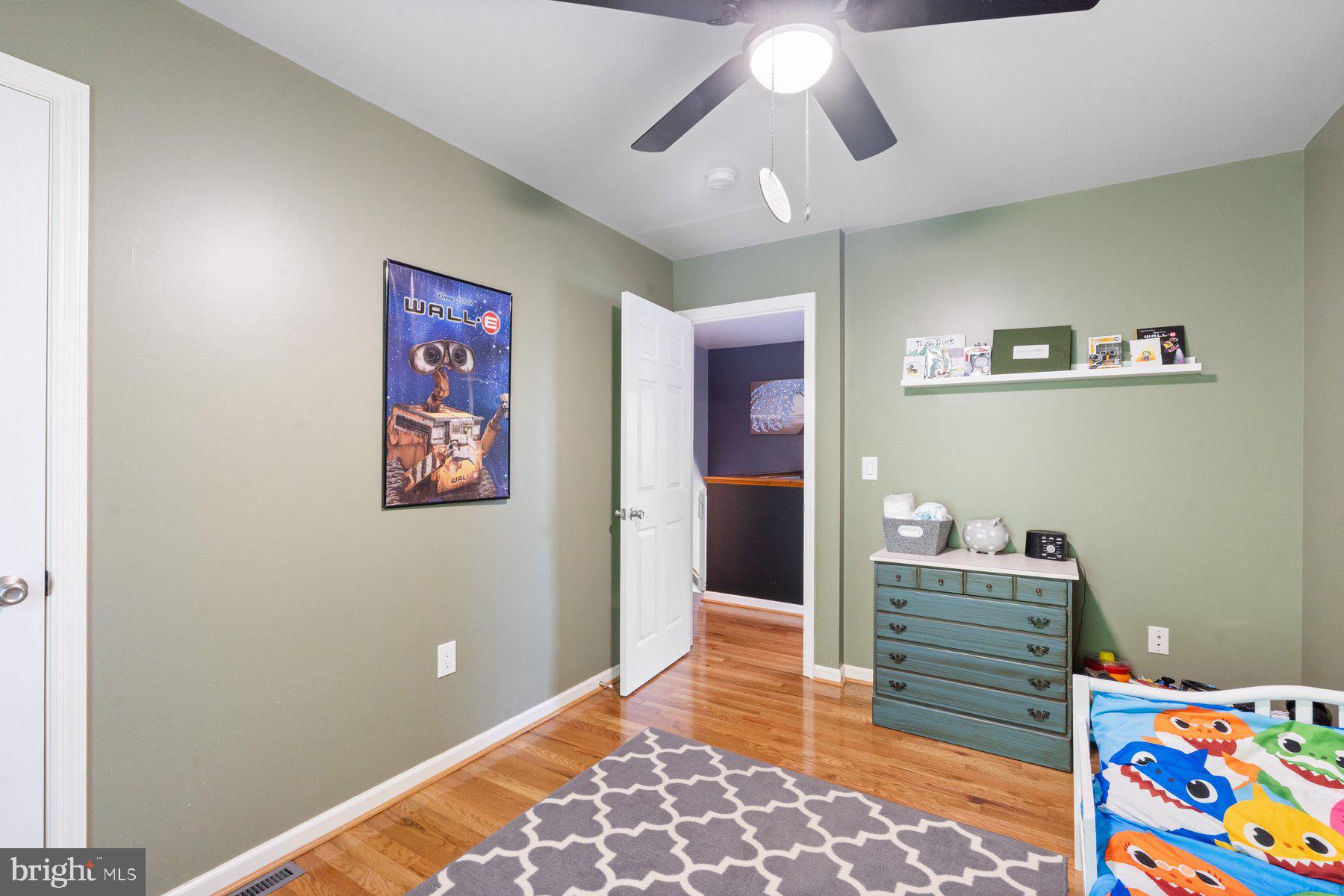 1903 Hain Road New Freedom, PA 17349 - Photo 28 of 40 a bedroom with a bed and a chandelier