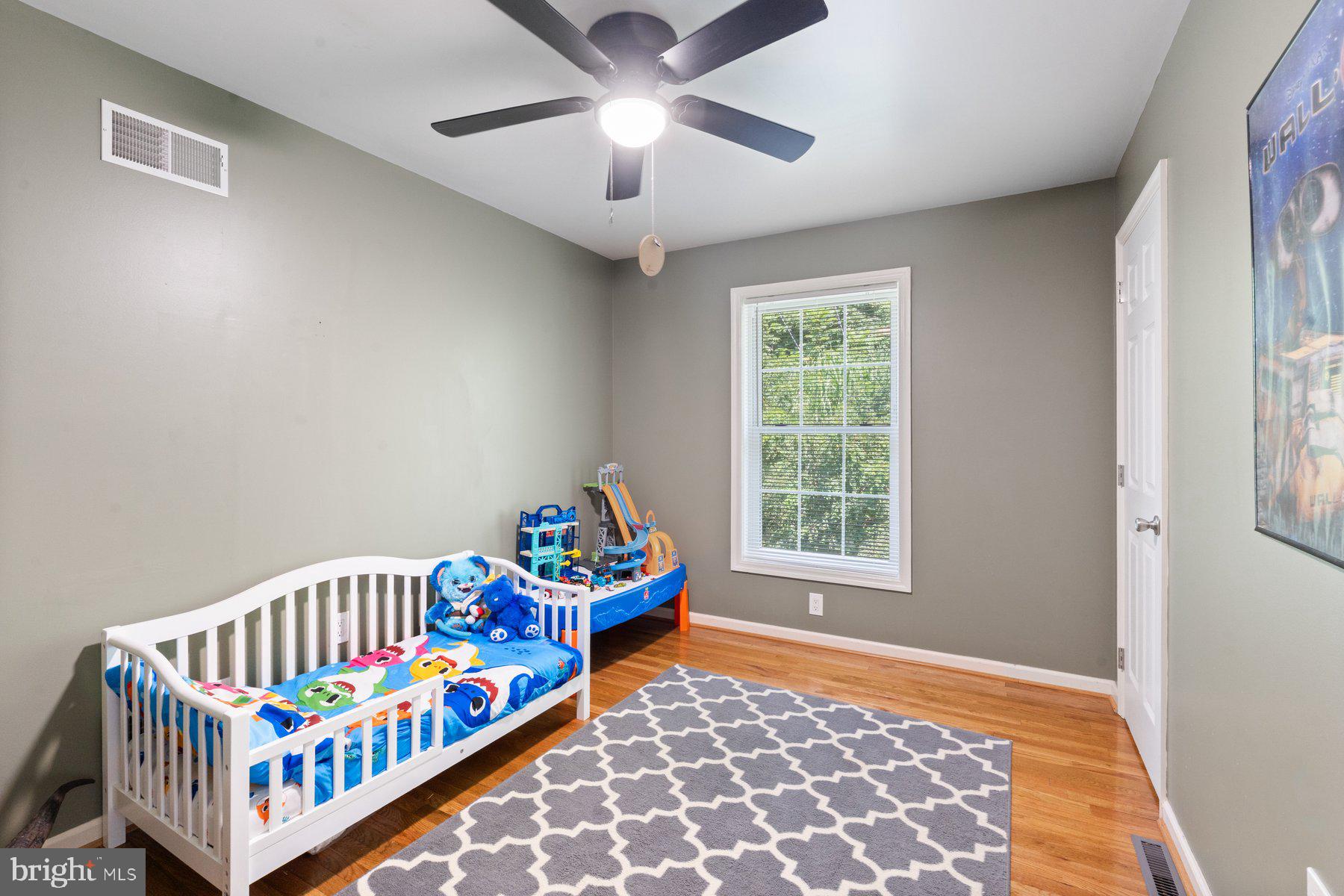1903 Hain Road New Freedom, PA 17349 - Photo 29 of 40 a bedroom with furniture a baby crib and a window