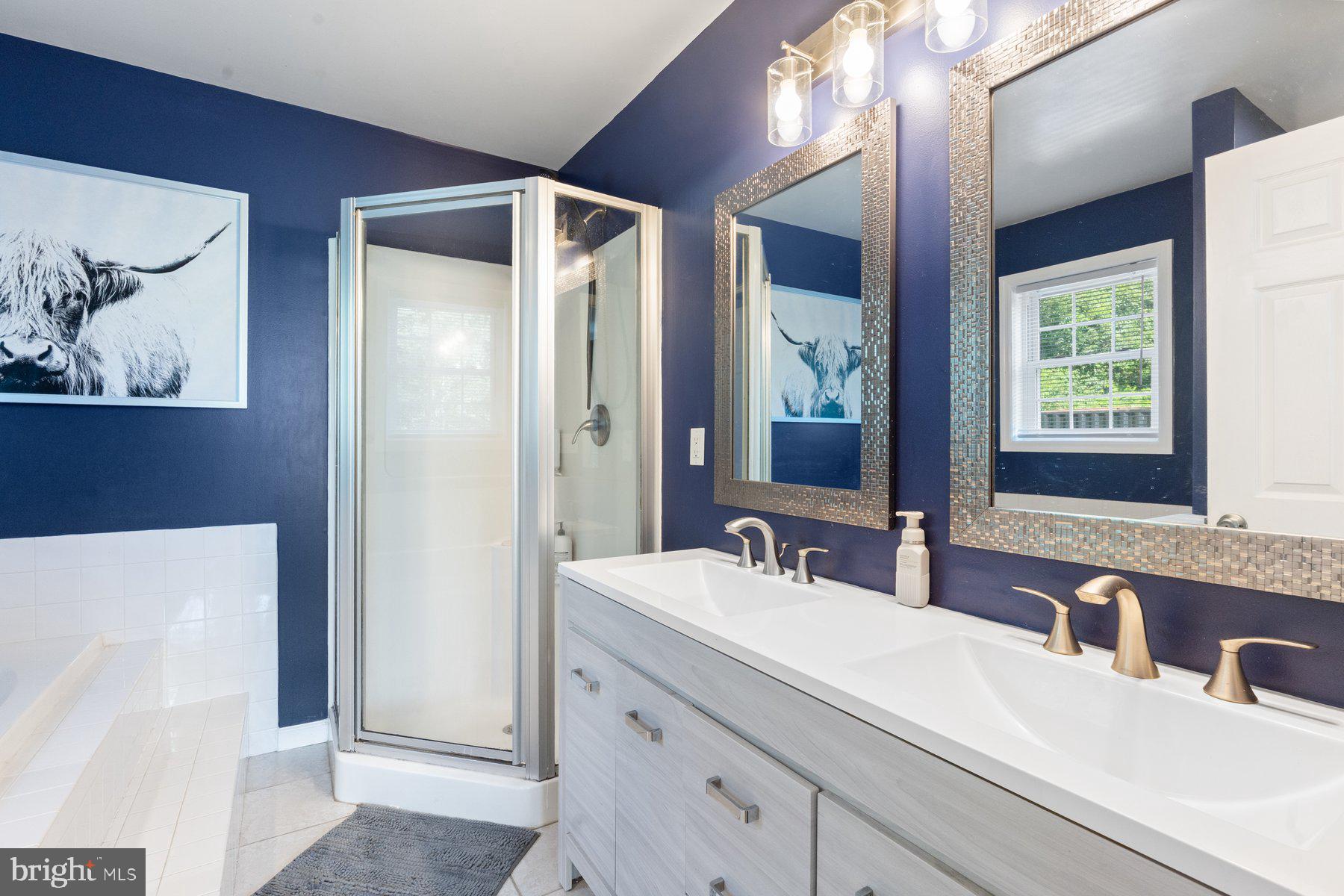 1903 Hain Road New Freedom, PA 17349 - Photo 35 of 40 a bathroom with a double vanity sink mirror and double