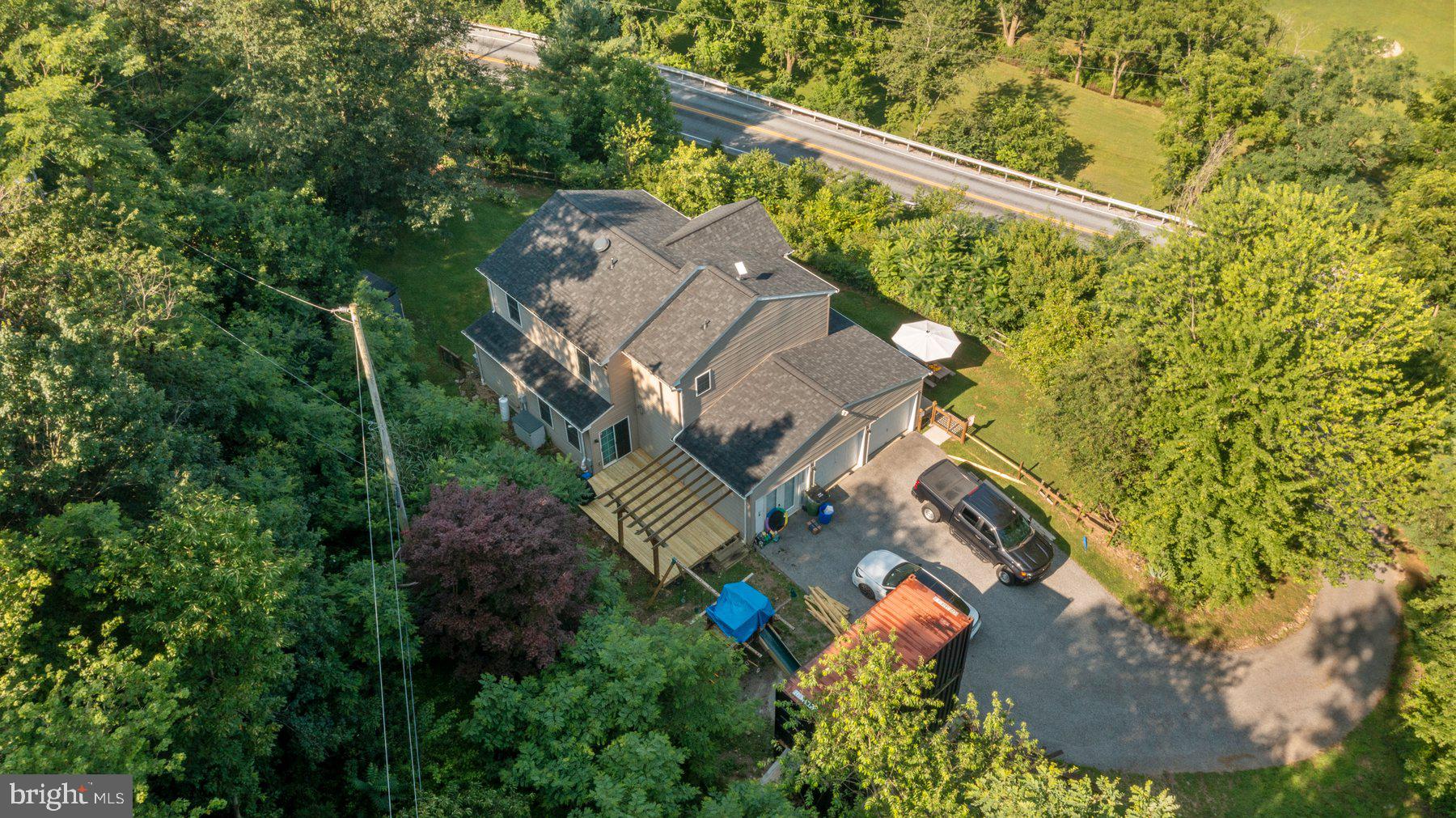 1903 Hain Road New Freedom, PA 17349 - Photo 4 of 40 an aerial view of a house with swimming pool and outdoor space