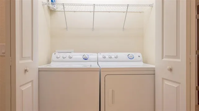 a utility room with dryer and washer