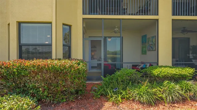front view of a house with a garden