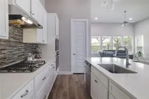 a house view with a garden space