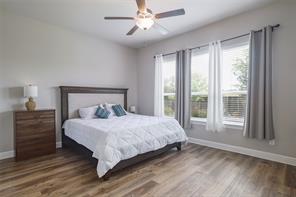 601 C-Bar Ranch Trail, Unit 51 Cedar Park, TX 78613 - Photo 14 of 33 Bedroom featuring wood finished floors and ceiling fan