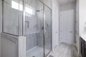 601 C-Bar Ranch Trail, Unit 51 Cedar Park, TX 78613 - Photo 17 of 33 Full bathroom with vanity and a shower stall