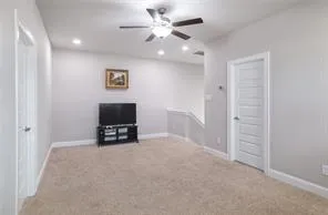 a view of workspace with wooden floor windows