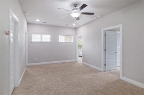 601 C-Bar Ranch Trail, Unit 51 Cedar Park, TX 78613 - Photo 20 of 33 Empty room with light carpet, ceiling fan, and recessed lighting