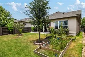 a view of backyard with green space