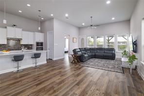601 C-Bar Ranch Trail, Unit 51 Cedar Park, TX 78613 - Photo 5 of 33 Living room with recessed lighting, ceiling fan, dark wood finished floors, and a high ceiling