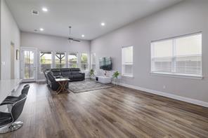 601 C-Bar Ranch Trail, Unit 51 Cedar Park, TX 78613 - Photo 6 of 33 Living area with dark wood finished floors and recessed lighting