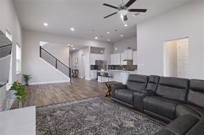 601 C-Bar Ranch Trail, Unit 51 Cedar Park, TX 78613 - Photo 9 of 33 Living room featuring stairway, wood finished floors, recessed lighting, and ceiling fan