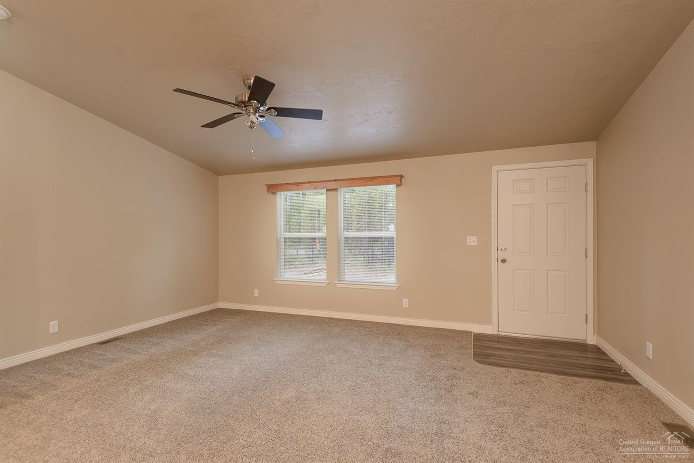 17237 Jacinto Road Bend, OR 97707 - Photo 11 of 20 a view of an empty room with a window