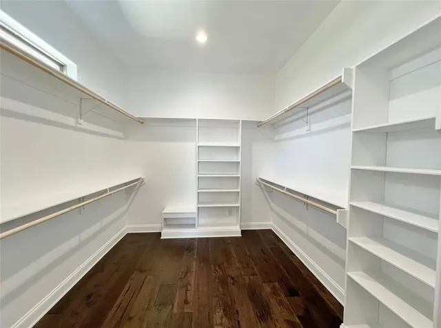 a storage room with wooden floor