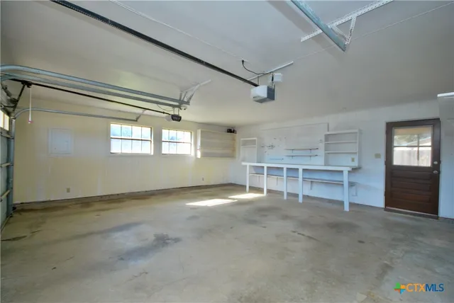 a view of a tiny house with a yard