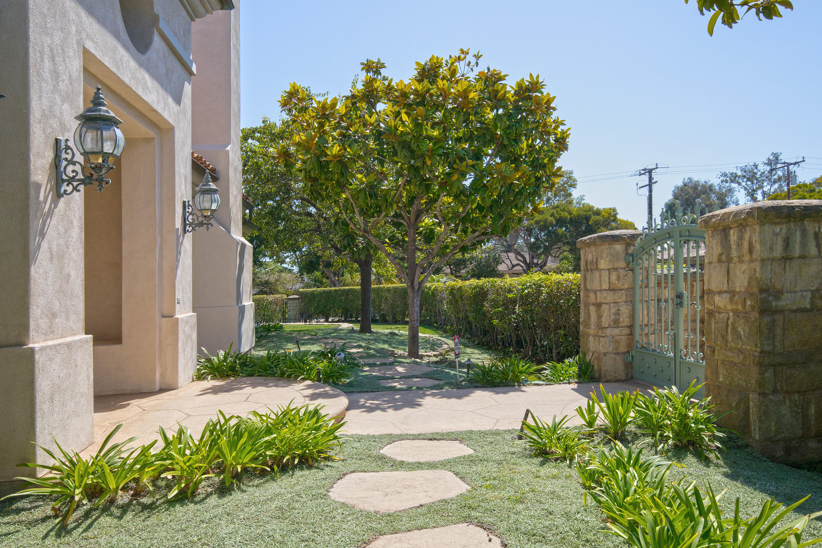 1138 Hill Road Montecito, CA 93108 - Photo 11 of 15 a backyard of a house with lots of green space