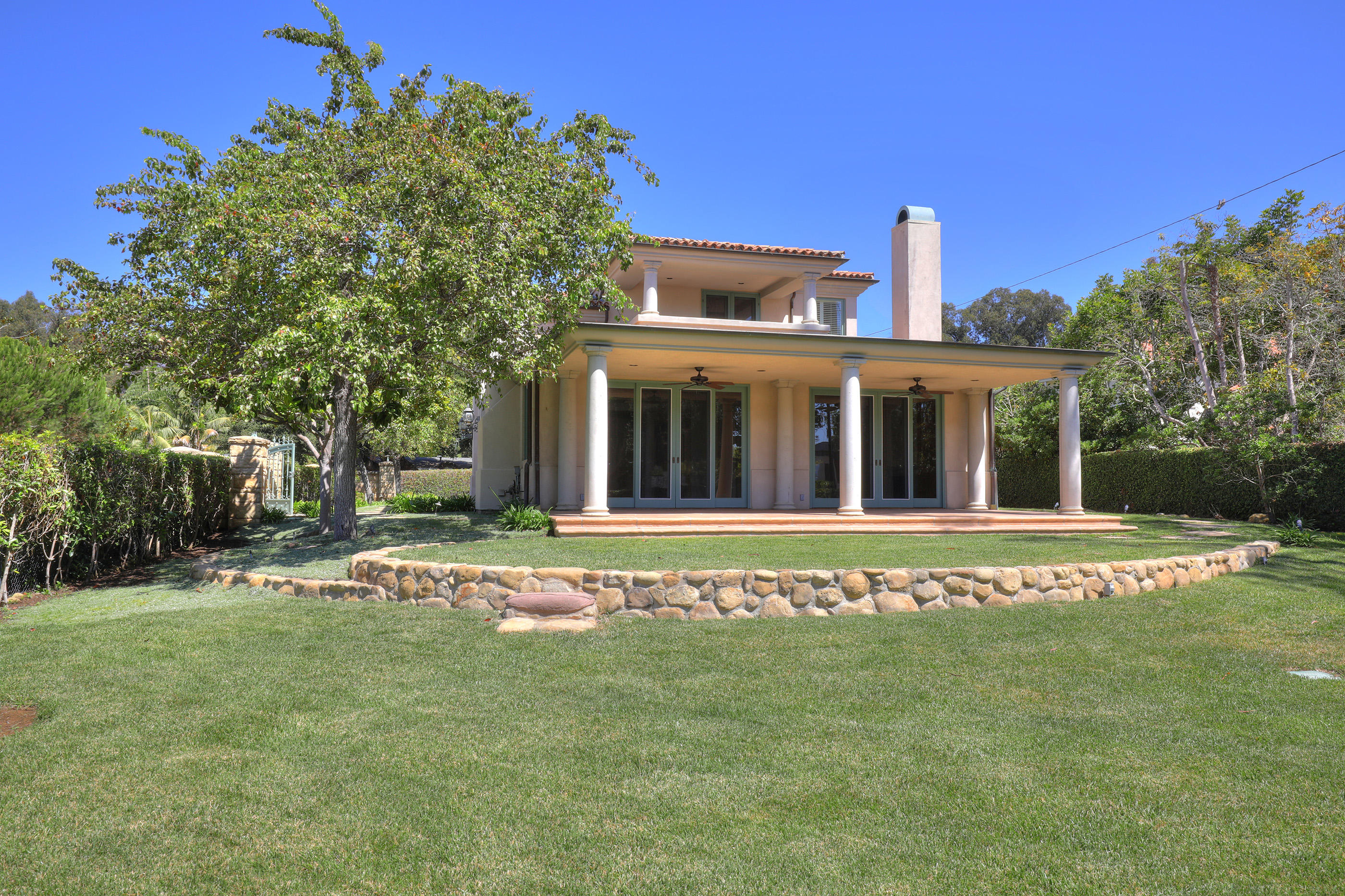 1138 Hill Road Montecito, CA 93108 - Photo 2 of 15 a front view of a house with a garden
